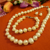  Édesvízi tenyésztett gyöngy nyaklánc + karkötő + fülbevaló