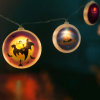 [] Halloween-i LED-es fényfüzér korongok 10 LED - 2 x AA - 1,35 m (56522)