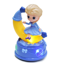 Játékos Holdacskán ülő, zenélő játékbaba szőke hajjal baba