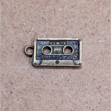  Kazetta, bronz szinű. Mérete: 12x24 mm dekorációs kellék