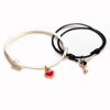  Páros zsinórszövet karkötő piros szív és fekete kulcs charmmal II.