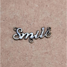  Smile' felirat. Mérete: 15x35 mm dekorációs kellék