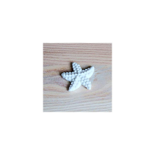 Tengeri csillag, polyrezin. Mérete: 25x5 mm dekorációs kellék