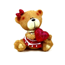  Ülő lány macifigura szívvel. Mérete: kb. 7 cm játékfigura